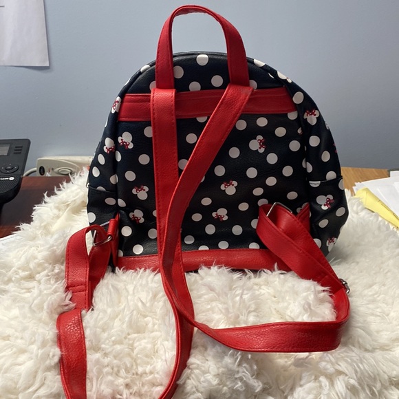 Cute Minnie Mouse mini backpack. Purchased at Disney Orlando. Gently used. - Picture 2 of 5